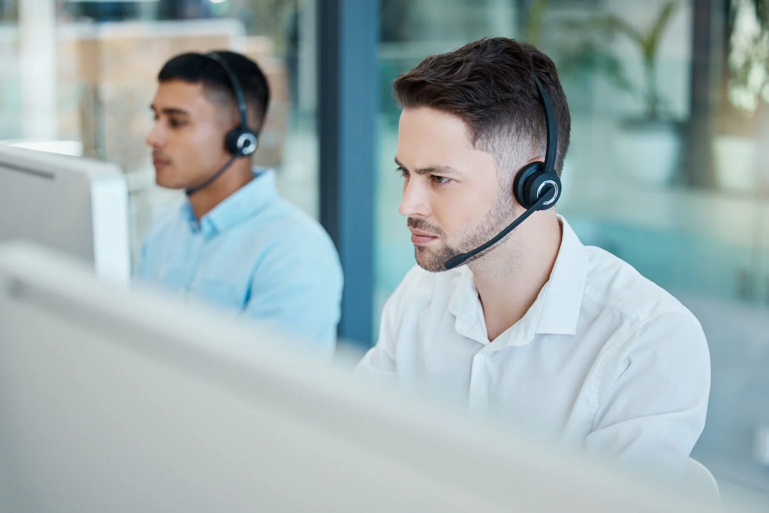 Call center focused businessman and helping with customer service advice online operator telemar 1536x1025